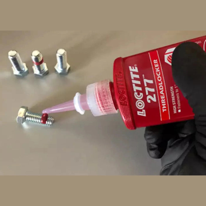 LOCTITE 277 threadlocker applied to a large threaded fastener